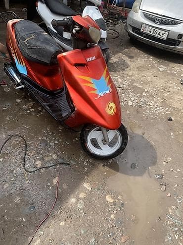ямаха jog: Скутер Yamaha Jog 100 (деколи “JOG”), красный металлик. Заводится едет — 7