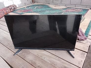 bluetooth speaker: Телевизор LED, диагональ примерно 32–40". Тонкая рамка, две — 1