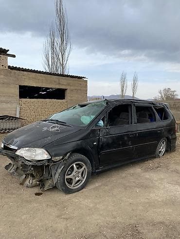 разбитые авто: Honda Odyssey (RA6/RA7) — черный минивэн, левый руль. Бензиновый — 1