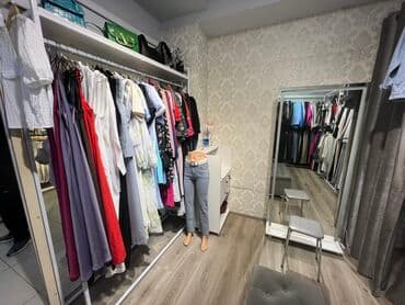 оборудование в бутик: Стеллажи для бутика одежды Кронштейны для бутика одежды Торговое — 21