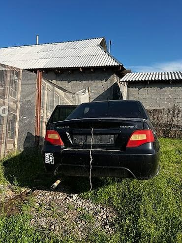 электромотоцикл для детей: Daewoo Nexia 1.6i, седан, черный цвет. разбор Нексия есть все — 5