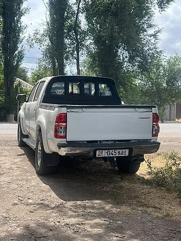 Транспорт: Toyota Hilux: 2014 г., 2.7 л, Механика, Бензин, Пикап — 4