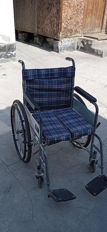 Инвалидная коляска с ручным приводом. - Тканевая спинка и сиденье с