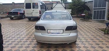 мазда фамиля: Mazda 6: 2002 г., 2 л, Механика, Бензин, Седан — 3