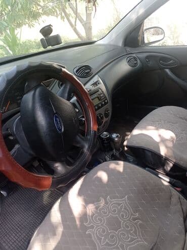 нива универсал: Универсал Ford Focus первого поколения, выполненный в серебристом — 4