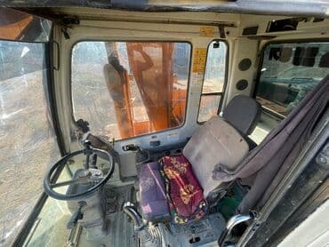 покрышка на погрузчик цена: Экскаватор, Колесный — 7