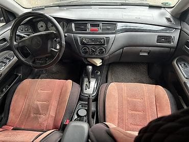 byd leopard 5: Mitsubishi Lancer: 2003 г., 1.6 л, Автомат, Бензин, Универсал — 8