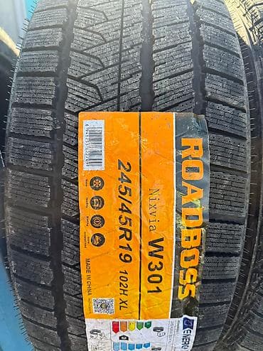 ф 90: Зимняя китайская шина. Фирма Roadboss made in China. Размер задних — 2