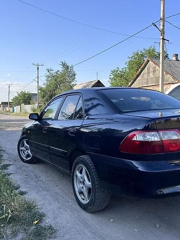 стоп gx: Mazda 626: 2000 г., 2 л, Механика, Бензин, Седан — 6