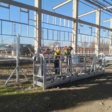 ун: Подвесная фасадная люлька (строительная платформа) для высотных работ — 1