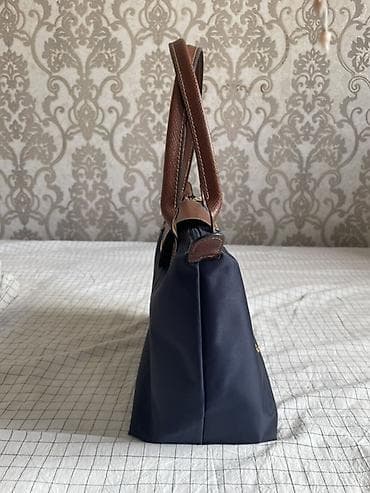 Аксессуарлар: Сумка Longchamp Le Pliage из нейлона с кожаными элементами — 3