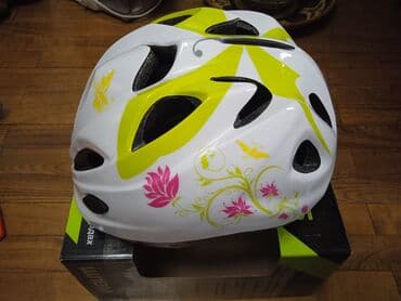 камеры для велосипедов: Велосипедный шлем белого цвета с ярким рисунком, включающим желтые — 1