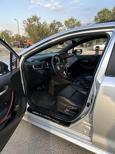 byd e2 2023: Toyota Corolla: 2021 г., 1.8 л, Автомат, Гибрид, Седан — 5
