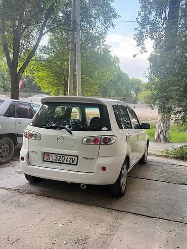 айни 95: Mazda Demio: 2005 г., 1.5 л, Автомат, Бензин — 7