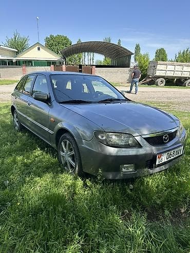 ауди универсал 80: Mazda 323: 2003 г., 1.6 л, Автомат, Бензин, Хэтчбэк — 2