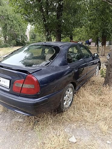 авто морник: Mitsubishi Carisma: 1998 г., 1.8 л, Автомат, Хэтчбэк — 4