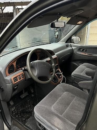 Унаа сатуу: Kia Carnival: 2002 г., 2.5 л, Автомат, Бензин, Вэн/Минивэн — 7