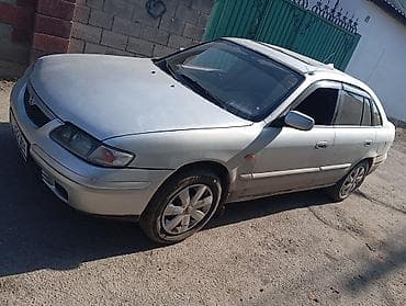 suzuki lets: Mazda 626: 2000 г., 1.8 л, Механика, Бензин, Хэтчбэк — 4