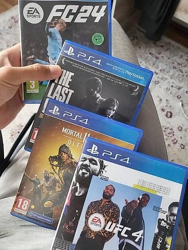 игры на playstation 2: Консоль PS4 Slim (чёрная) - 1терабайт • 2 контроллера DualShock 4 — 3