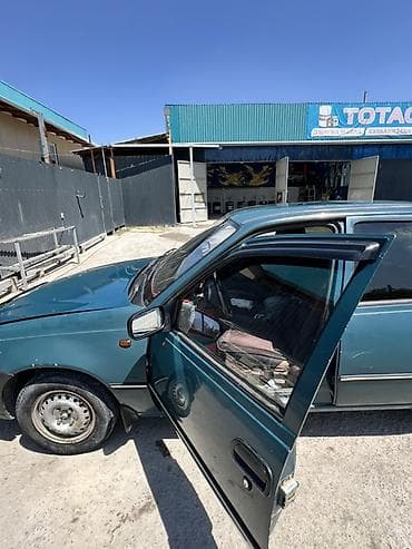 2 4 д: Daewoo Nexia: 2003 г., Механика, Бензин, Седан — 5