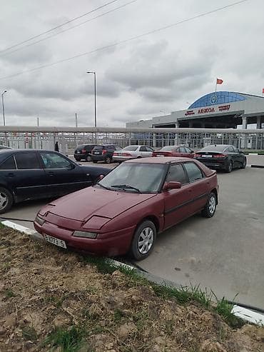 решетка демио: Mazda 323: 1993 г., 1.6 л, Ручные, Бензин, Седан — 2