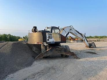 штанговый мотор или цепной: Экскаватор, 2003 г., Колесный — 5