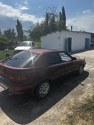 neta gt: Mazda 323: 1994 г., 1.6 л, Механика, Бензин, Хэтчбэк — 4