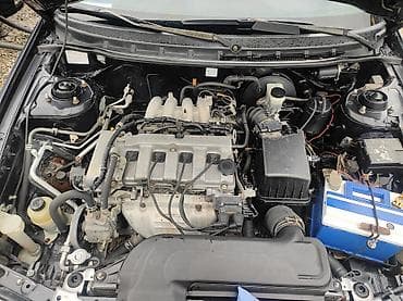 панель 211: Mazda 626: 1999 г., 2 л, Механика, Бензин, Седан — 8