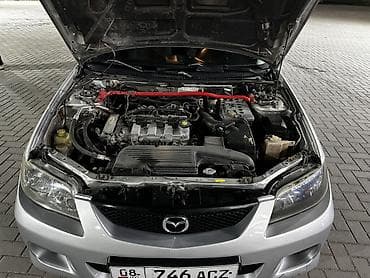 кондидер: Mazda 323: 2002 г., 2 л, Механика, Бензин, Хэтчбэк — 10