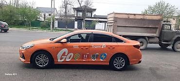 eos m: Оранжевый седан с брендированием «Яндекс Go» — готовый автомобиль для — 7