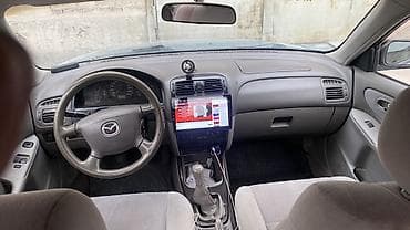 Mazda 626: 2000 г., Механика, Бензин, Седан