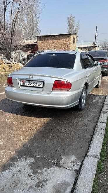 Башкалар: Седан серебристого цвета. Основные особенности: - Кузов: 4-дверный — 6