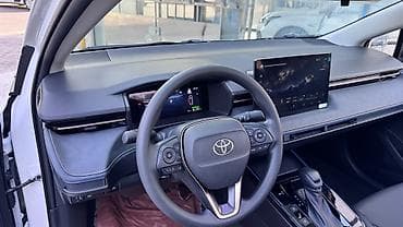 плуг мини: Toyota Corolla: 2026 г., Гибрид, Седан — 8