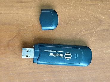 Модемы и сетевое оборудование: 3G USB‑модем Beeline (брендированный Huawei) - Модель: Huawei E1550 — 2