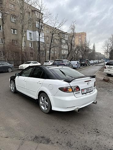 выхлопная трасса: Mazda Atenza: 2003 г., 2.3 л, Типтроник, Бензин, Лифтбек — 5