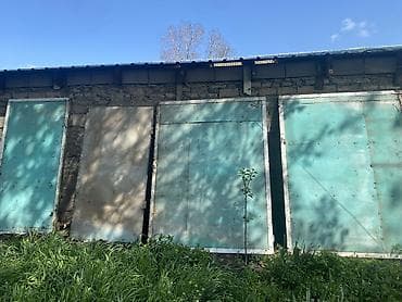 Металлические распашные гаражные ворота из листовой стали с жестким