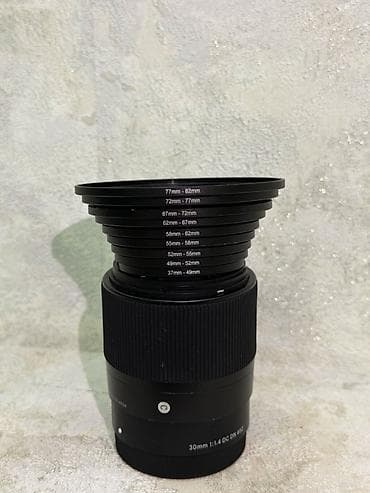 venom comp: Объектив SIGMA 30mm f/1.4 DC DN (ø52) - Фокусное расстояние: 30 мм — 4