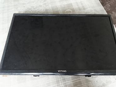 iphone хr: Телевизор VITYAS (жк/LED), диагональ около 24–26". На корпусе сзади — 7