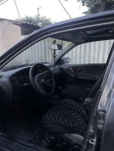 Транспорт: Nissan Primera: 1992 г., 2 л, Механика, Бензин, Седан — 7