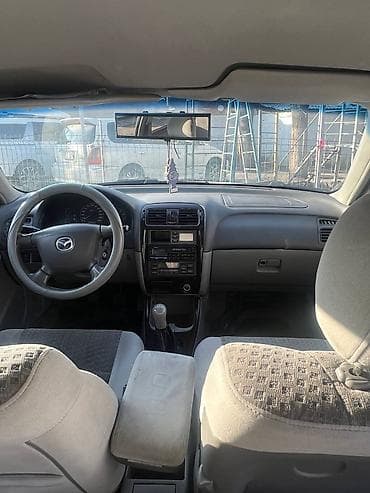 mazda 5: Mazda Capella: 2000 г., 1.8 л, Механика, Бензин, Хэтчбэк — 9