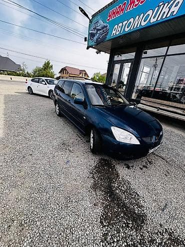 Транспорт: Mitsubishi Lancer: 2004 г., 1.6 л, Типтроник, Бензин, Универсал — 1