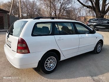 volvo fm: Toyota Corolla: 2003 г., 1.6 л, Ручные, Бензин, Универсал — 4