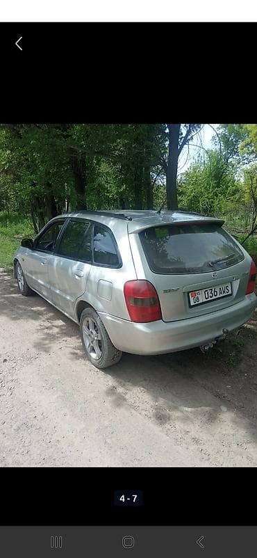 erec m8: Mazda 323: 2003 г., 1.6 л, Механика, Бензин, Универсал — 2