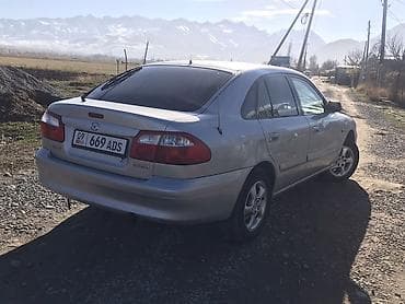 12 220: Mazda 626: 2000 г., 2 л, Механика, Бензин, Седан — 3