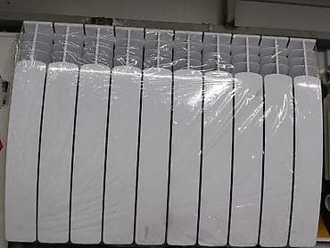 паравой отапления: Секционный радиатор отопления (биметалл/алюминий), 10 секций, белый — 1