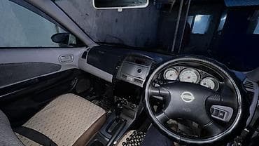Nissan Wingroad: 2002 г., 1.6 л, Автомат, Бензин, Универсал — 7