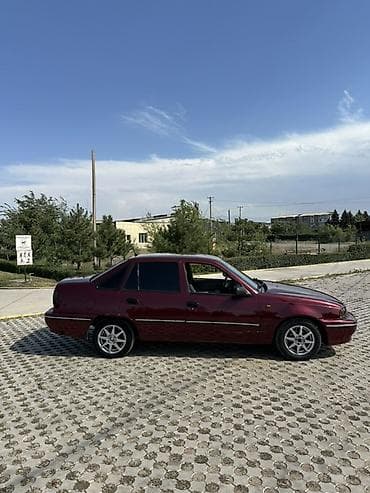 дамкрат авто: Daewoo Nexia: 2005 г., 1.5 л, Механика, Бензин, Седан — 2