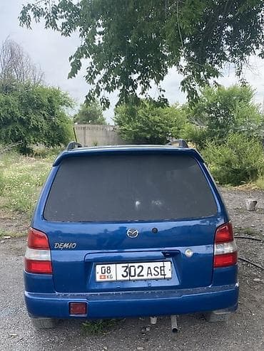 авто крепежи: Mazda Demio: 1999 г., 1.3 л, Механика, Бензин, Хэтчбэк — 3