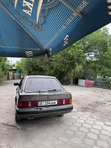 byd leopard: Ford Escort: 1990 г., Автомат, Бензин, Седан — 4