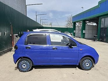 жел майн: Автомобиль Daewoo Matiz синего цвета, выполненный в кузове хэтчбек — 8